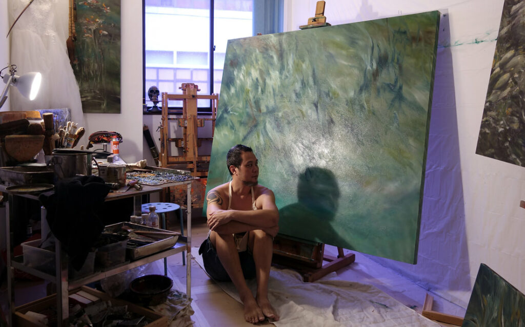 andy yang sitting in studio copy orig