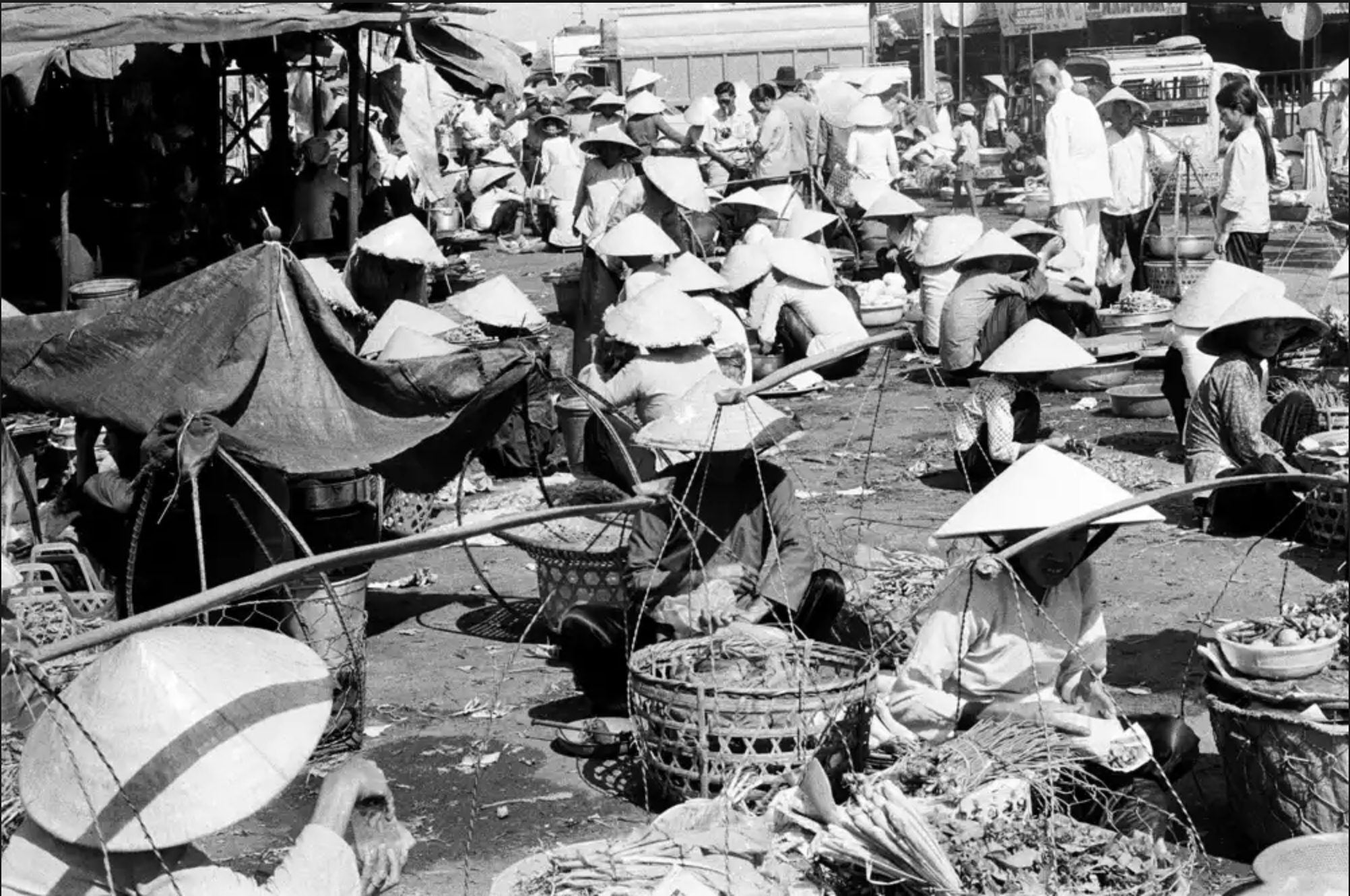 Gilbert Bertrand's Market in the Shade of Nón Lá